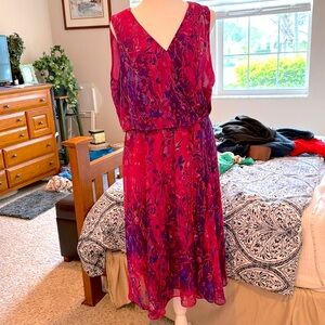 Zipper in back from neck down. Fully lined.